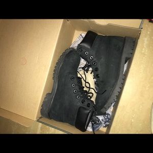 Gently used Black Timberlands